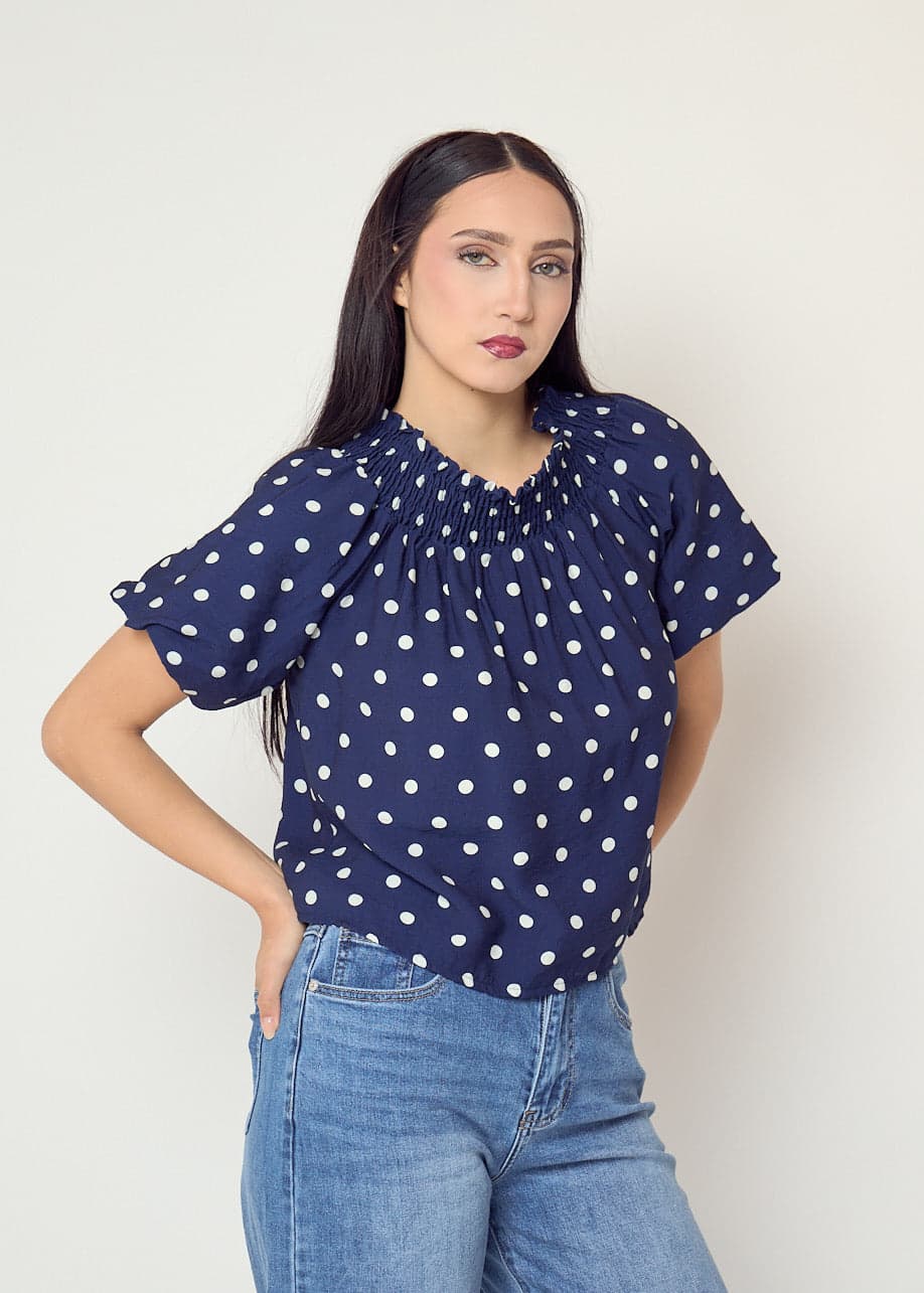 Blusa azul marino de lunares